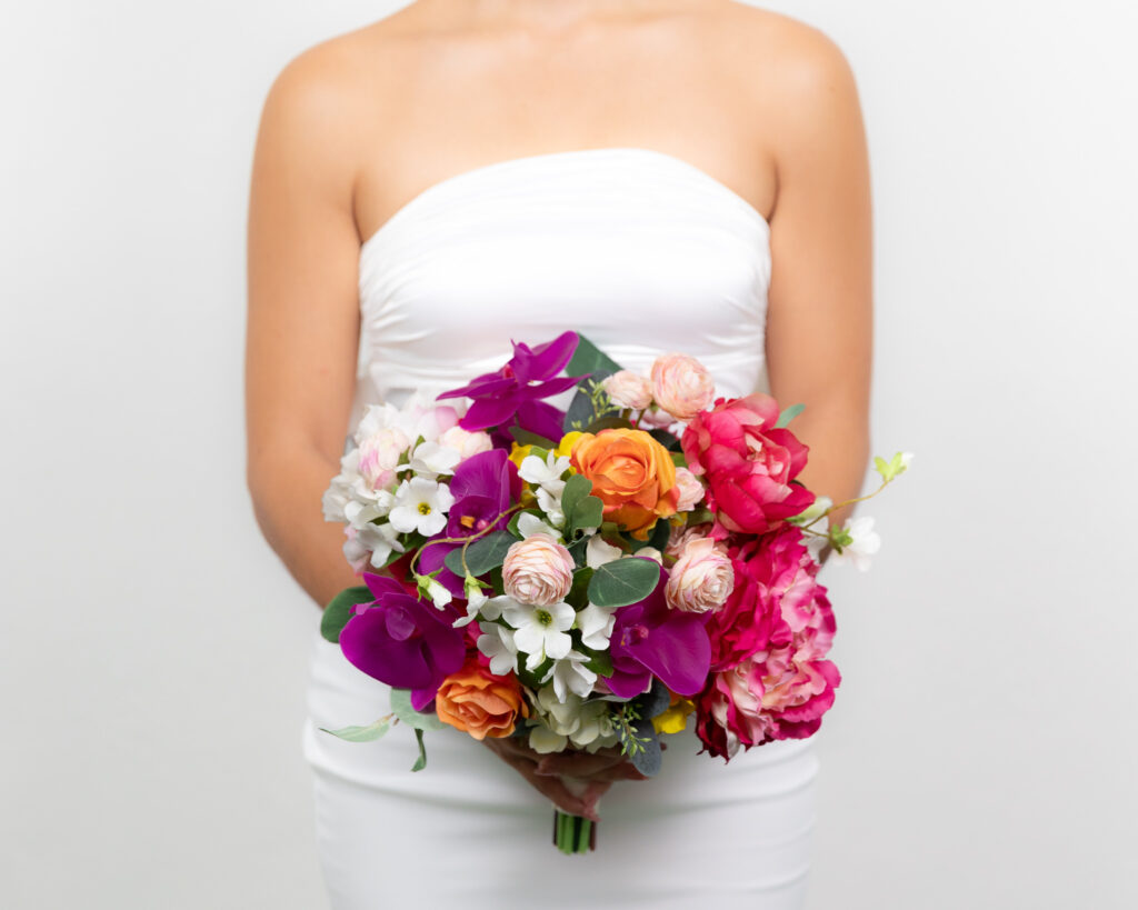 Bride bouquet with colorful artificial flowers in Cancun and Riviera Maya